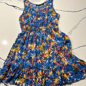Ripe floral summer dress with ruffles across the bottom.  Size M